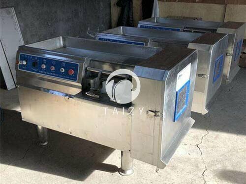 Meat dicing machine